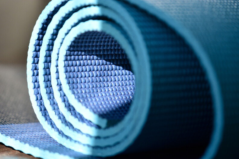 A rolled yoga mat