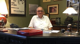 Jim Halsey photographed at his desk in 2017.