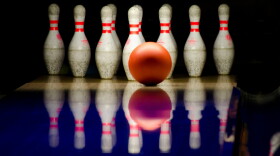 Bowling ball and pins at bowling alley