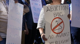 Rabbis and supporters from around the country gather for a rally, one day after the midterm elections, to show their support for protecting abortion rights, Nov. 9, 2022, in Clayton, Missouri.