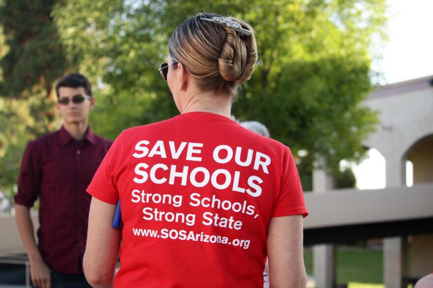 Teachers gathered outside Mountain View High School at 7 a.m.