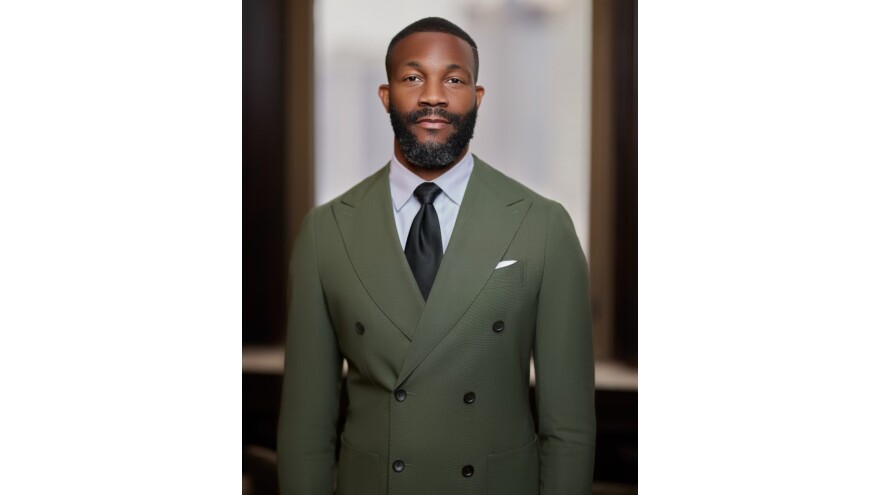 Picture of Birmingham Mayor Randall Woodfin in an olive green suit