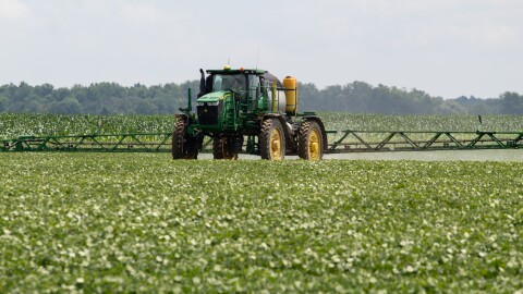 A John Deere tractor fertilizing a field of dry black beans at the Stoutenburg family farm in Sandusky, Michigan. Manufacturers of farm equipment, including John Deere, argue that allowing farmers and independent mechanics to fix equipment could jeopardize intellectual property.