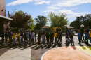 Students line up outside a playground.