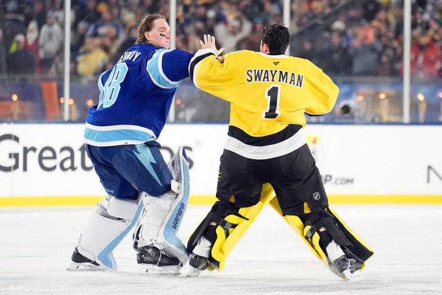 hockey goalies get ready to fight