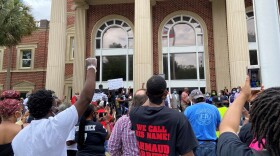 Hundreds of people gathered in front of the Glynn County Courthouse on a recent Saturday in May to demand justice for Ahmaud Arbery, who was shot and killed in February in Brunswick, Ga.