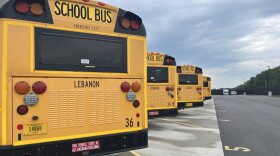 School buses wait for Indiana students on Aug. 6, 2026.