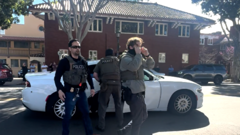 ICE agents in Downtown Santa Barbara after arresting a man accused of vandalizing a law enforcement vehicle.