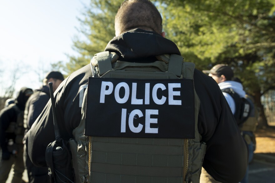 U.S. Immigration and Customs Enforcement Baltimore Field Officer director Matt Elliston listens during a briefing, Monday, Jan. 27, 2025, in Silver Spring, Md.