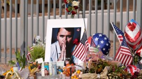 FILE - A makeshift memorial grows in size at the Turning Point USA headquarters after the shooting death at a Utah college of Charlie Kirk, the 31-year-old founder and CEO of the organization, Sept. 17, 2025, in Phoenix. (AP Photo/Ross D. Franklin, File)