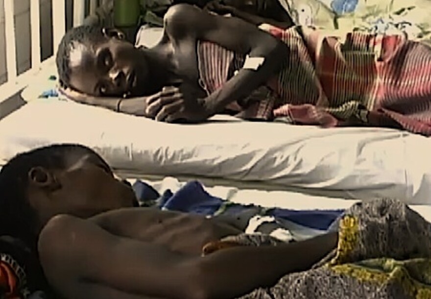 Patients at a hospital clinic in Chamoio, Mozambique, where the UW's Health Alliance International offers programs, including work with those afflicted by HIV/AIDS.