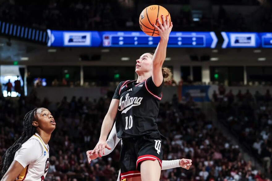 IU's Shay Ciezki drives to the basket during Sunday's NCAA Tournament game against South Carolina.