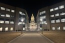 The Wyoming Capitol building at night.