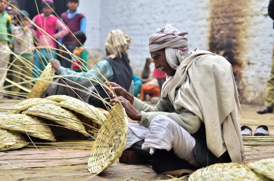Baburam, 70, weaves baskets by hand — and seethes that after six decades of Indian independence, his village still has no power.