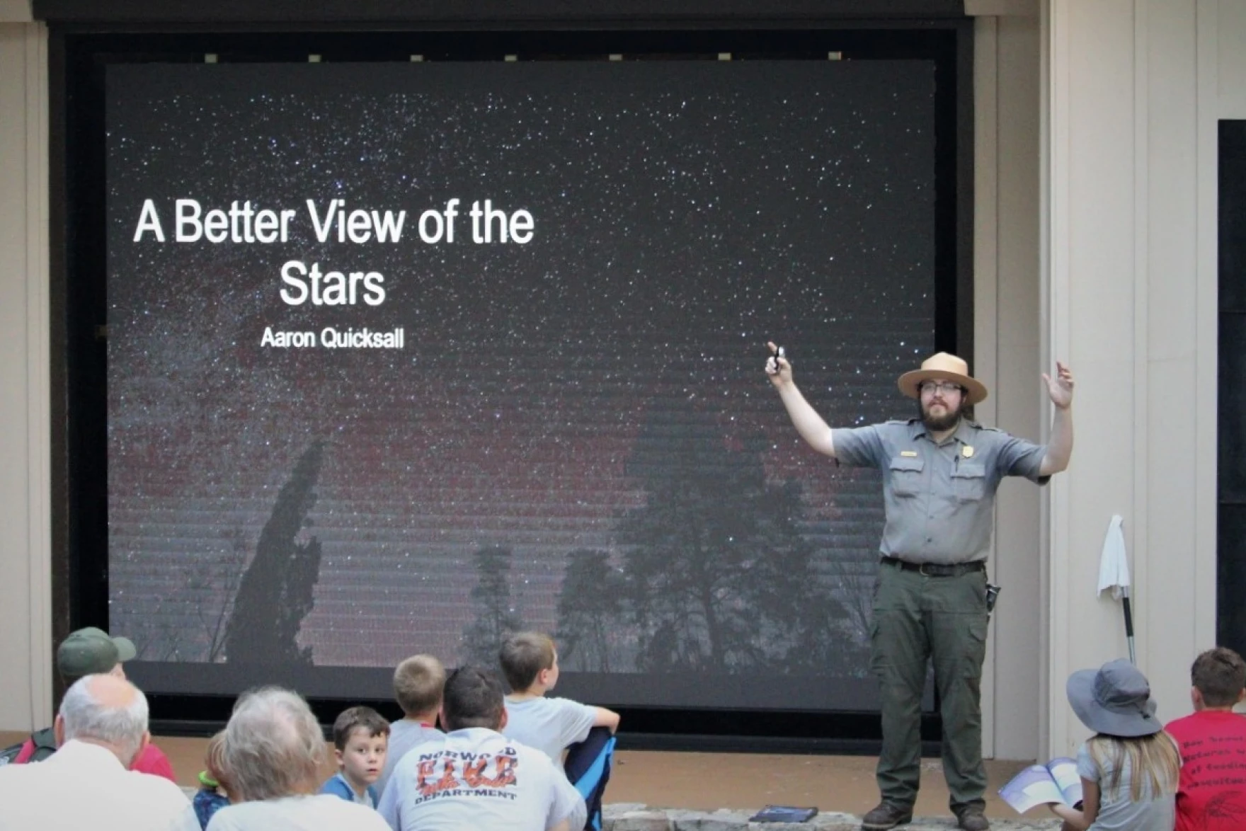 mammoth cave stars program presenter in front of screen