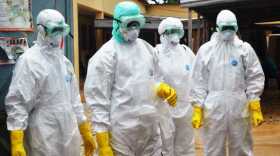 guineas-red-cross-health-workers-wearing-protective-suits-in-conakry-on-september-14-2