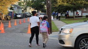 A student arrives at McDonogh 42 on the first day of in-person classes, Sept. 17, 2020.