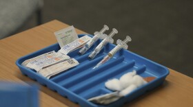 Syringes are prepared for the measles, mumps and rubella vaccine at a clinic in Lubbock, Texas, on Feb. 26, 2025.