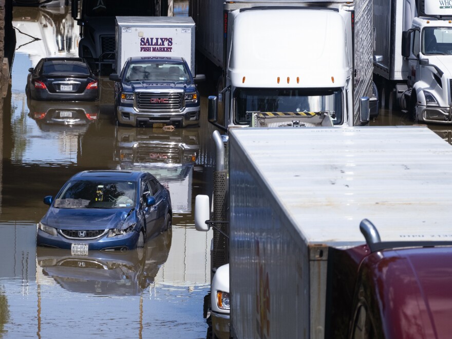 Cars and trucks are stranded by high water Thursday, Sept 2, 2021, on the Major Deegan Expressway in Bronx borough of New York as high water left behind by Hurricane Ida still stands on the highway hours later.