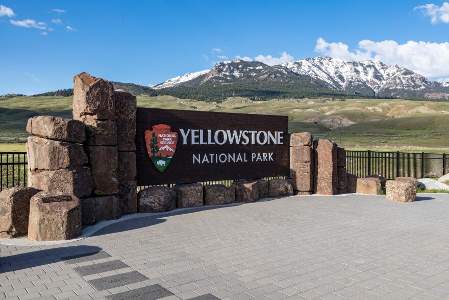 FILE - This photo provided by the National Park Service shows a sign marking the north entrance of Yellowstone National Park, May 7, 2018.