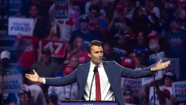 Turning Point USA Founder Charlie Kirk speaks during a campaign rally for Trump in Glendale, Ariz., in August 2024.