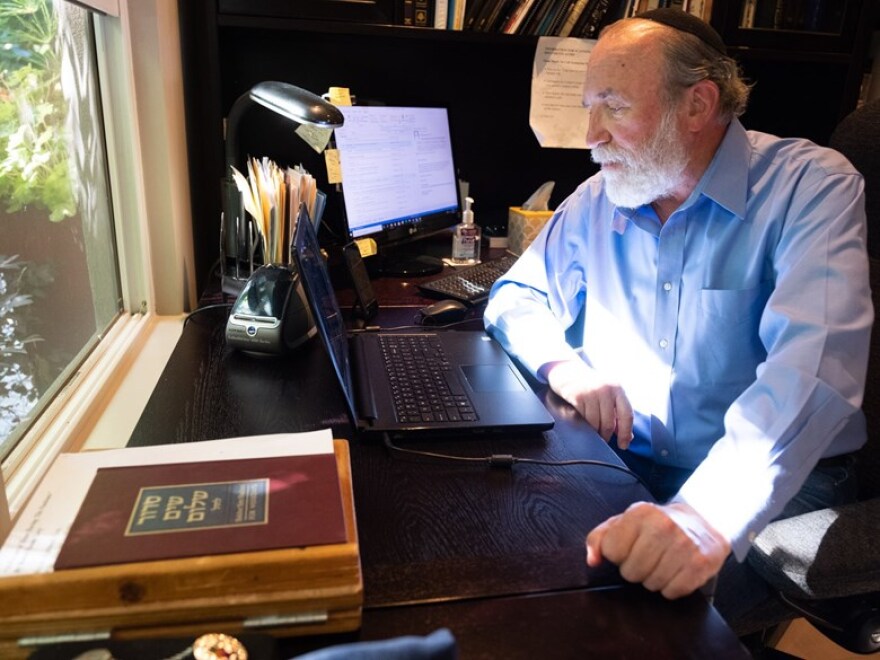 Rabbi Reuven Taff teaches a class over Zoom for 10th graders that are part of the Mosaic Law Congregation from his home on Tuesday, May 26, 2020.