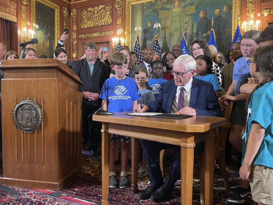 Democratic Wisconsin Gov. Tony Evers signed a two-year spending plan into law.