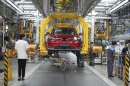 Workers assemble a car at a Vinfast factory in Hai Phong, Vietnam, on Sept. 29, 2023. Vietnamese automaker Vinfast has plunged right into the crowded and hypercompetitive U.S. auto market, gambling that if it can sell its electric vehicles to finicky Americans, it can succeed anywhere. So far, that gamble has yet to pay off.