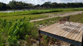 Docks are high and dry after a spill gate failure at Lake Dunlap in May 2019.