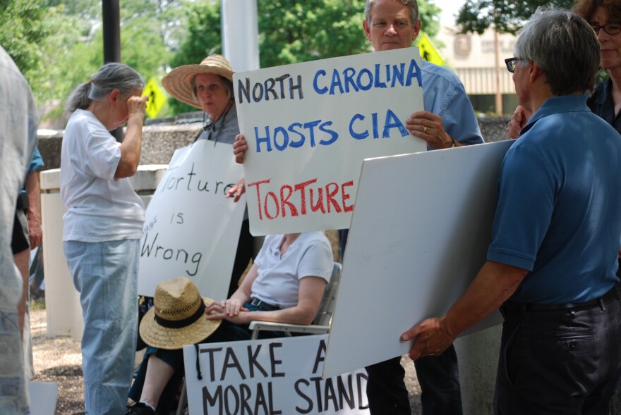 More signs from NC Stop Torture Now Protest