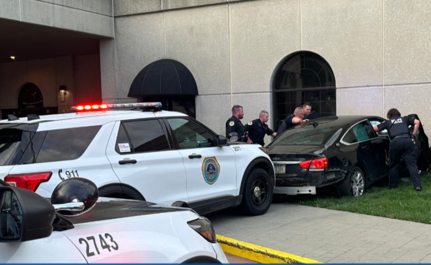 Des Moines police officers arrest a man after he tried to run down pedestrians on the sidewalk. He sped away from police and crashed the car into the wall of the Embassy Suites hotel downtown.