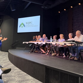 Farmer James Cade, who opposes the proposed large-scale solar array, addresses the Wexford Joint Planning Commission on Monday. (Photo credit: Vivian La/IPR News)