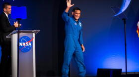 Artemis III crew member Frank Rubio waves to the crowd during a press conference at Johnson Space Center on Tuesday, June 9, 2026, in Houston. (Annie Mulligan/AP)
