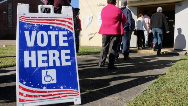 Louisiana residents at a voting precinct.