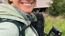 Anna Rose MacArthur catching a four-wheeler ride in Napakiak, Alaska.