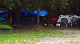 A new version of "Tent City" is appearing next to the new Grace Marketplace shelter off Waldo Road.