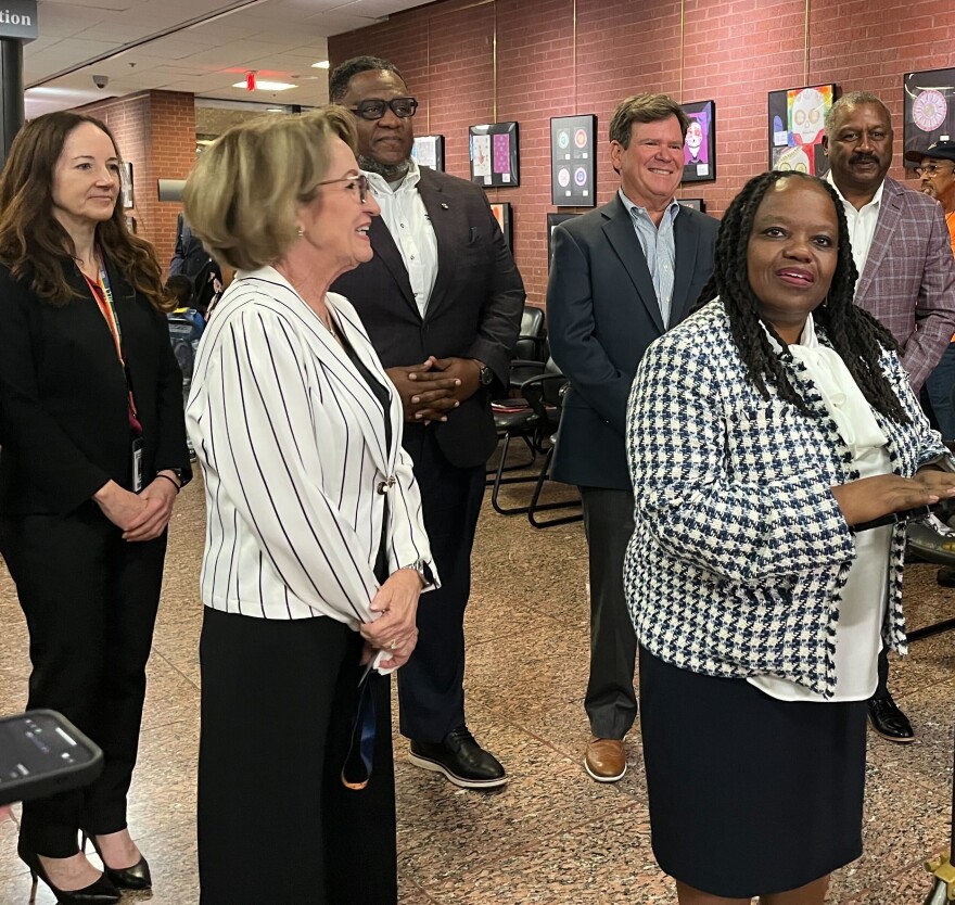 Eatonville Mayor Angie Gardner talks to the media after a unanimous vote by the Orange County School Board approving the first steps of a land transfer for the former Hungerford School property.