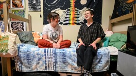 Roommates Annalise Caul, left, and Moe Warren sit on Warren’s bed on Wednesday, April 17, 2024, in their shared dorm room at George C. Brooks Hall in Columbia. The pair became close friends during high school when Warren moved in with Caul’s family. In the years since their meeting, the 18-year-olds have watched one another’s queer identities evolve. Moe began using they/he pronouns and came out as trans masculine, nonbinary and demiromantic while Annalise found that pansexual, asexual and aromantic labels fit her best. “You'll always find your people,” Caul said. “No matter how early or late in life, you will be able to get either that one person or those people who are going to accept you and love you for who you are.”