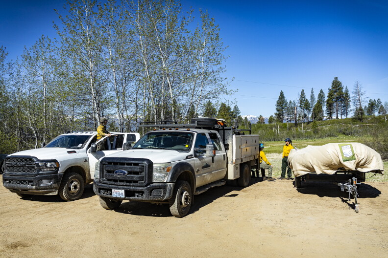 A Nature Conservancy fire crew gets ready to head out to check the Crawford prescribed fire's lines. 