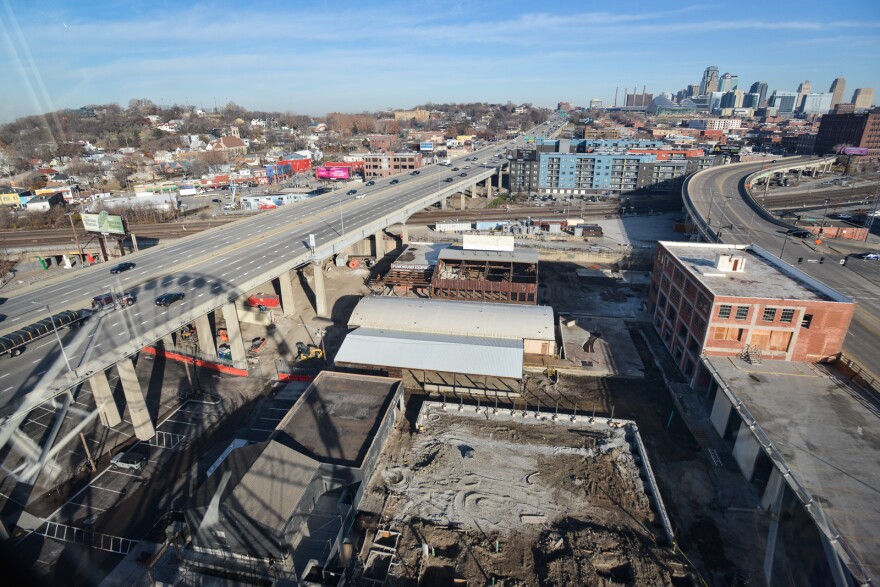 The midmorning shadow of the KC Wheel falls across the northbound lanes of I-35 Thursday.