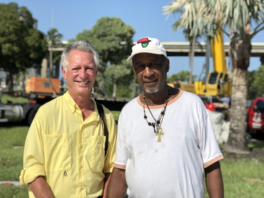 Tom Hall, Fort Myers Public Art Committee (left), poses with local activist Lodovic Kimble before the