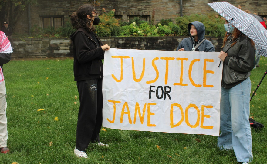 Protesters gathered in a courtyard outside the meeting of the Cornell Board of Trustees on Friday.