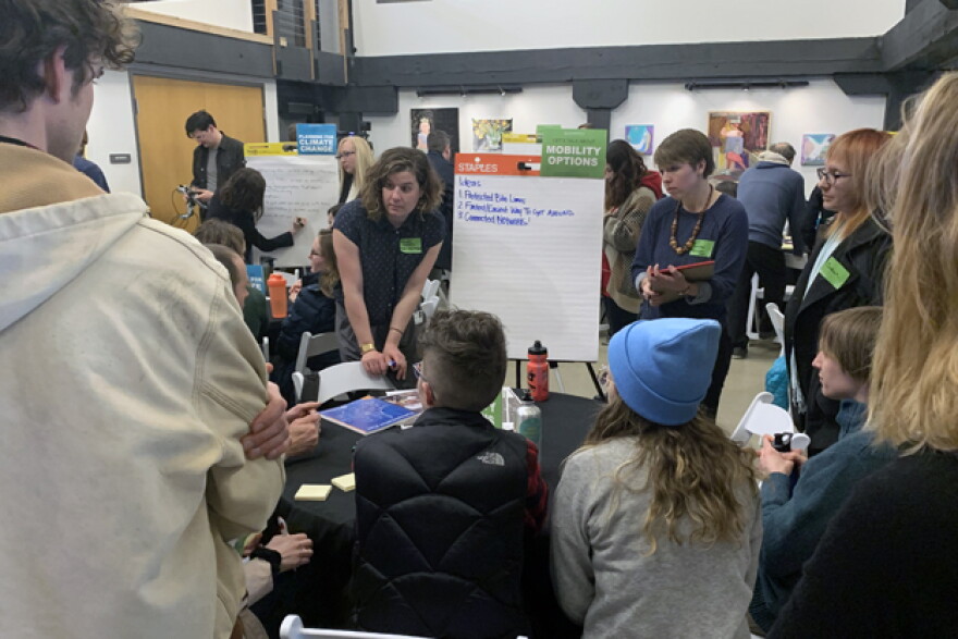 Public discussion spread out to different topic tables.