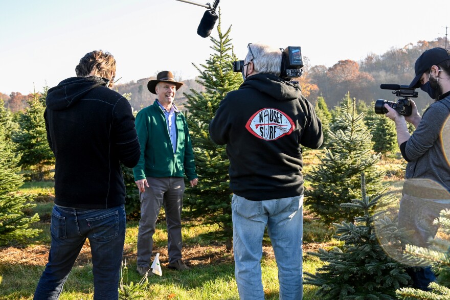 FILE: Garden expert Charlie Nardozzi hosts New England Gardening Holiday Edition at Van Wilgen’s Garden Center in North Branford, CT November 9, 2020. Charlie (facing cameras) describing various types of natural trees for indoor holiday decorating. Crew left to right is Ryan Caron King, Mike Dunphy and Tyler Russell.