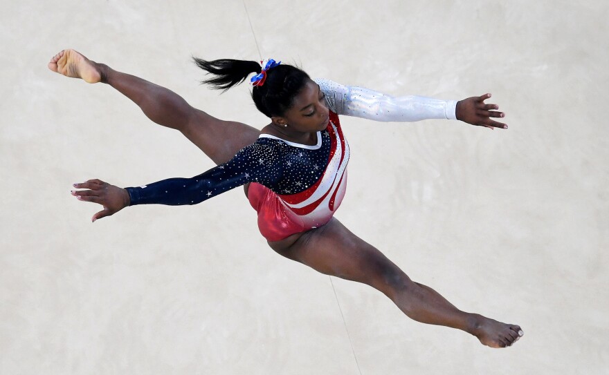 Simone Biles of the United States competes in the floor event during the women's team final.