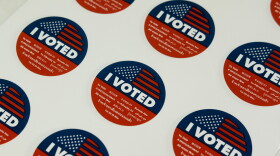 FILE - "I Voted" stickers wait for voters on the Super Tuesday, at a voting center in El Segundo, Calif., Tuesday, March 3, 2020. (AP Photo/Ringo H.W. Chiu)