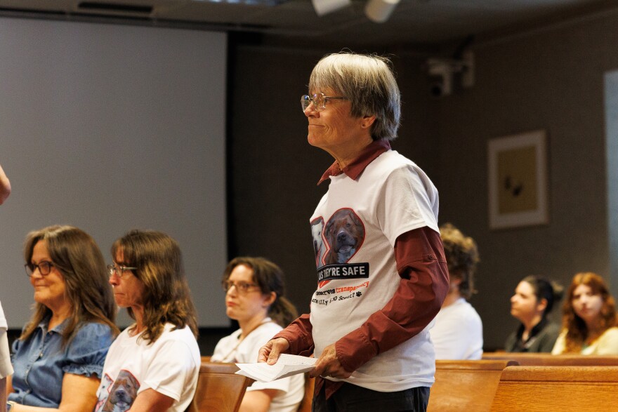 Chris Deutsch waits in line to speak about concerns over Alachua County Animal Resources at a County Commission meeting in Gainesville, Fla., Tuesday, March 10, 2026.