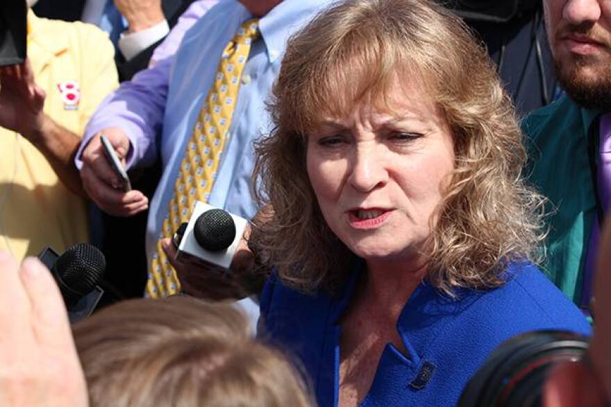 State superintendent Glenda Ritz talks to reporters after announcing her candidacy for governor of Indiana.