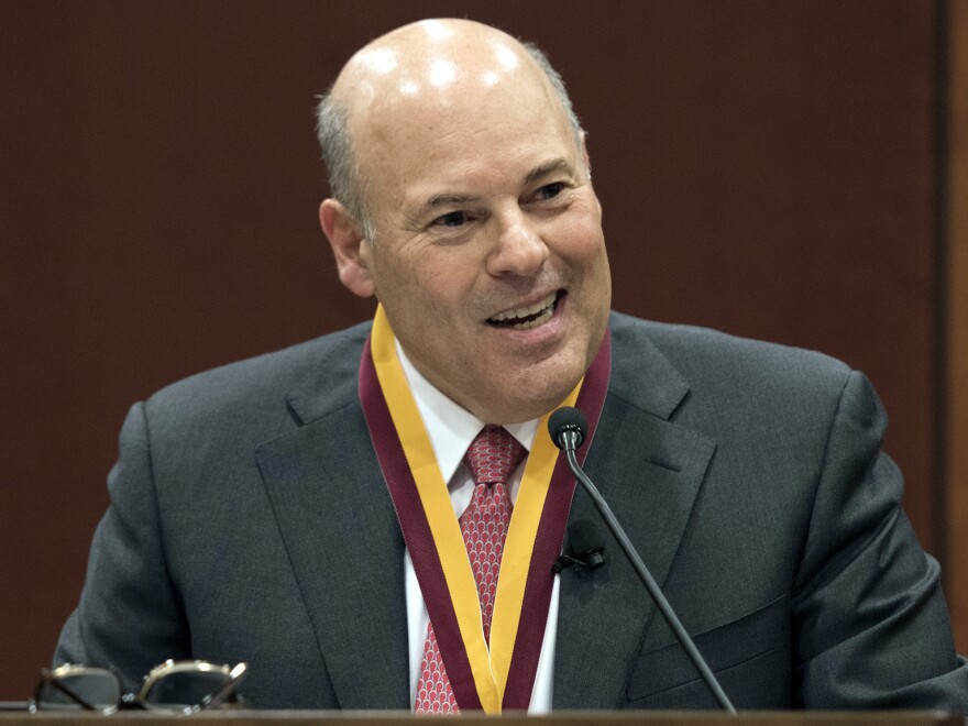 Louis DeJoy, pictured in 2017, became the nation's 75th postmaster general last month. DeJoy's plans for the Postal Service have generated controversy.