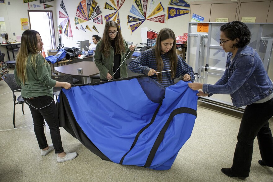 An all-girls science club from San Fernando High School in California has designed a solar-powered tent to tackle homelessness. (Scott Witter/Redux)